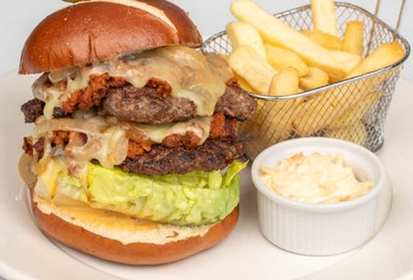 -Bad boy burger; two 6oz patties, Monterey Jack cheese, chili con carne, sauteed onions