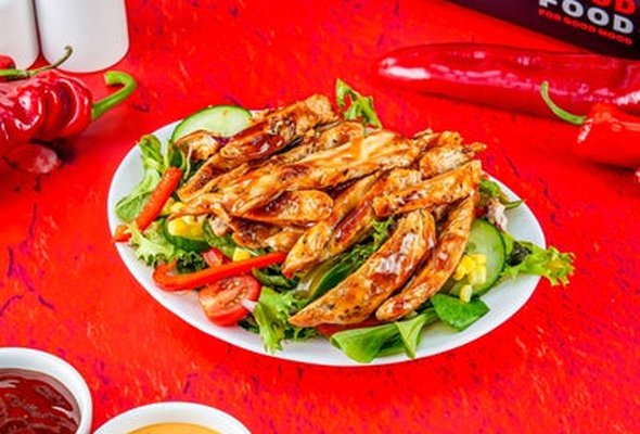 Sweet and Smoky BBQ Salad served with a drink.