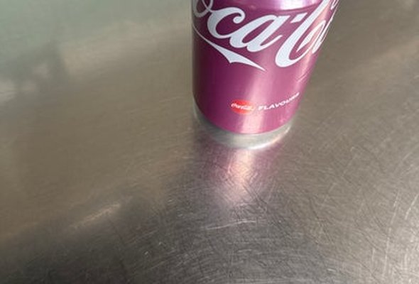 Cherry coke can of pop