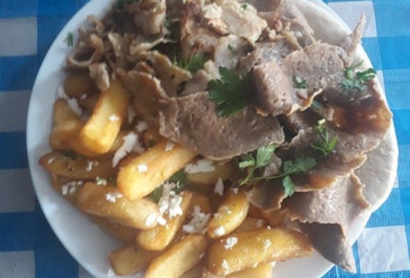 Mix served with chips pitta bread sallad and tzatziki dip