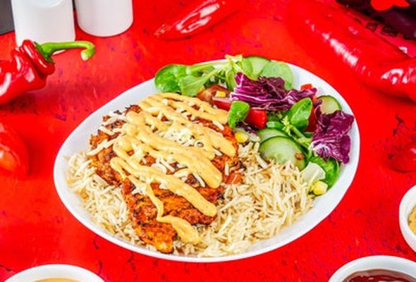 Peri Rice Box with a drink.