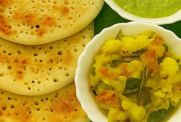 Set Dosa (3 pieces) served with potato paliya and coconut chutney