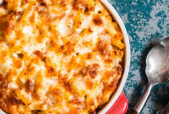 House Made 3 Cheese Mac & Cheese  loaded with  fresh Chicken Tenders