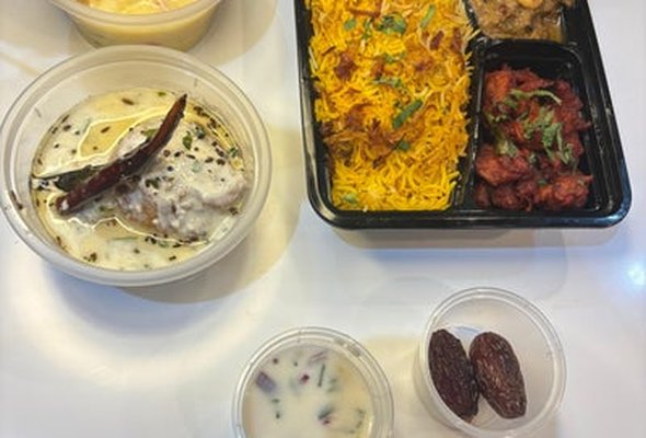 Iftar Box 4, Lamb Biryani, Haleem, Chicken 65, Dahi Bade, Fruit Custard, Dates, Water 500ml