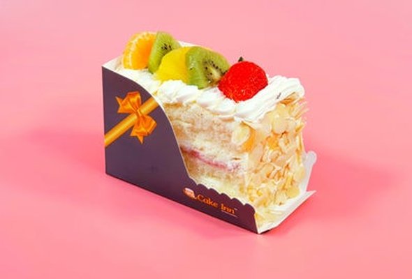 Fruit, Nut, and Cream Cake Slice