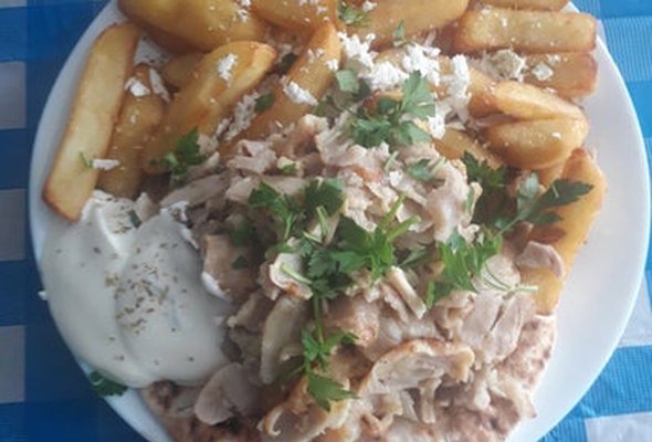 Mixed Kebab served with chips pitta bread sallad and tzatziki dip