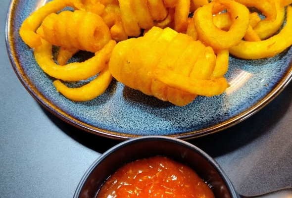 Twisted french fries with sauce